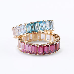 BLUE AND PINK TOPAZ EMERALD CUT ETERNITY BAND