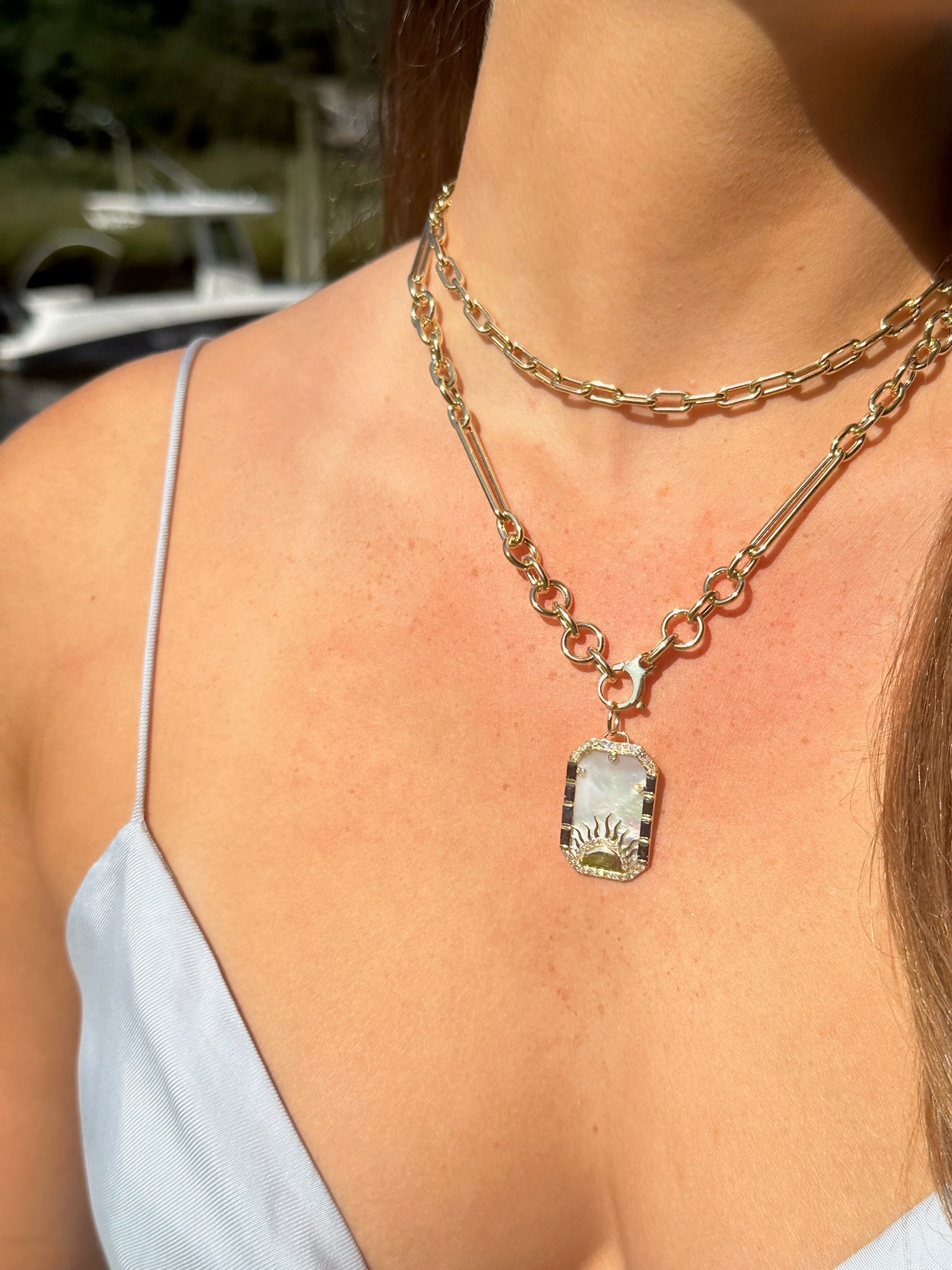 Mother of Pearl with Sapphire and Diamond Sun Medallion
Sapphire and Diamond Sun Medallion with Mother of Pearl
Diamond and Sapphire Sun Pendant with Mother of Pearl
Luxury Mother of Pearl and Sapphire Diamond Sun Medallion
Sun Medallion with Mother of Pearl, Sapphire, and Diamonds
Sun medallion
Mother of Pearl pendant
Sapphire pendant
Diamond charm
Fine jewelry
Designer necklace
Luxury pendant
Statement jewelry
Custom medallion