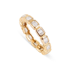 BEZEL SET EMERALD CUT DIAMOND ETERNITY BAND