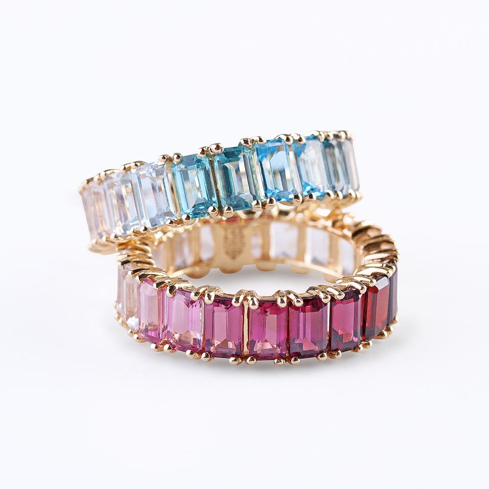 BLUE AND PINK TOPAZ EMERALD CUT ETERNITY BAND