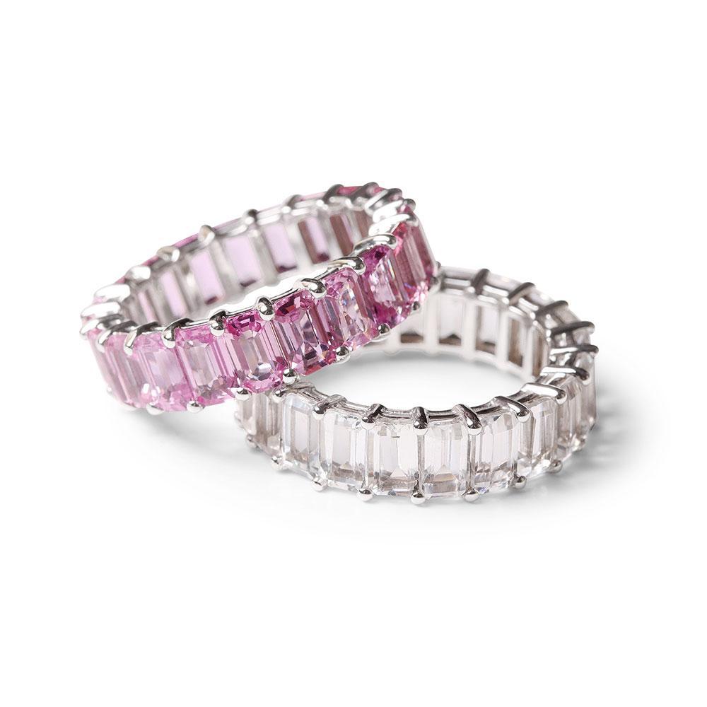WHITE TOPAZ AND PINK SAPPHIRE EMERALD CUT ETERNITY BANDS