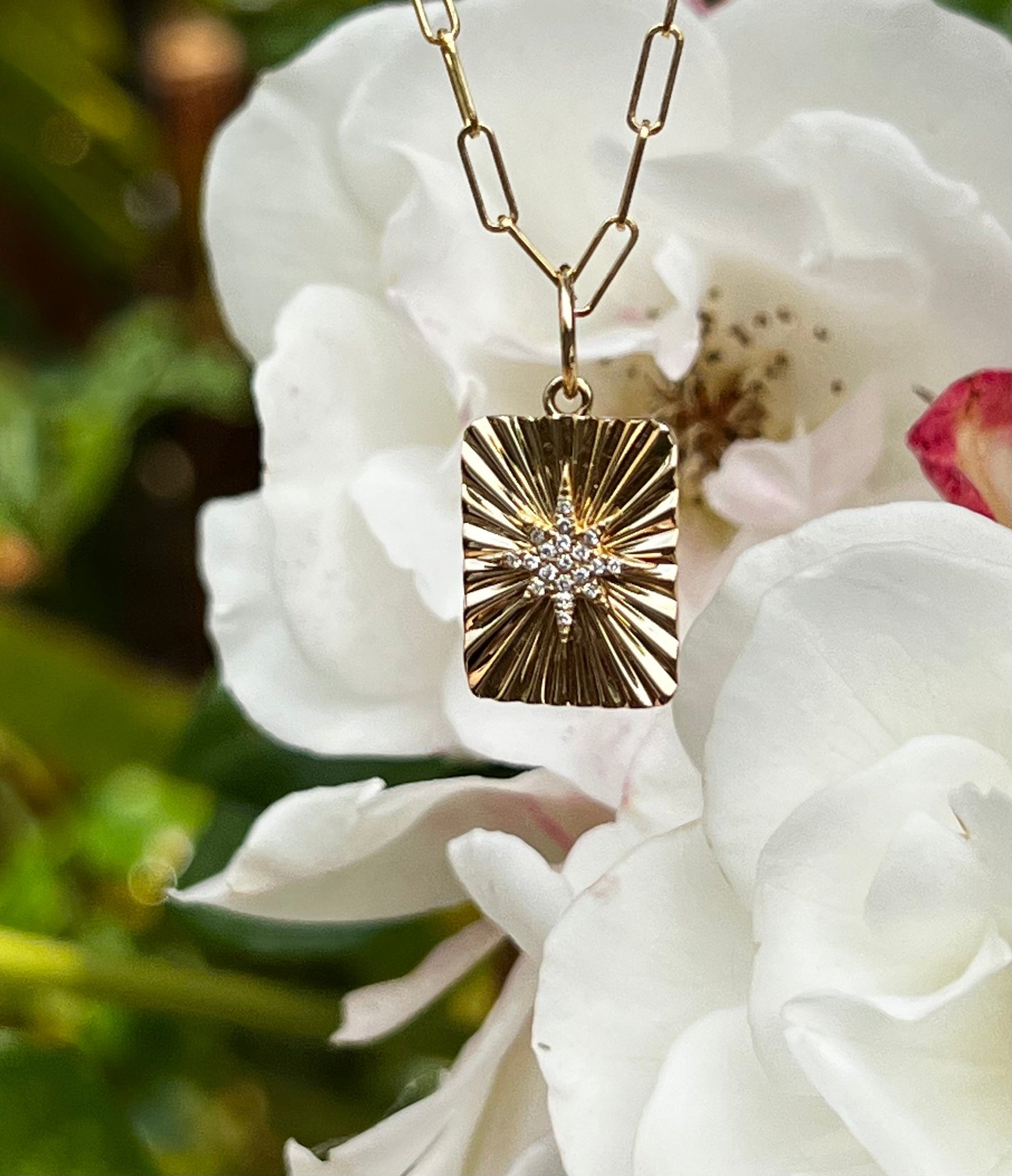 FLUTED 14K GOLD WITH DIAMOND STAR CHARM
Fluted 14K Gold with Diamond Star Charm
14K Gold Fluted Star Charm
Diamond Star Fluted Charm
Fluted Star Charm in 14K Gold
Gold and Diamond Star Charm Pendant
Diamond charm
Fluted charm
Gold charm
Star charm
Fine jewelry
Designer charm
Luxury jewelry
Statement charm
Pendant charm