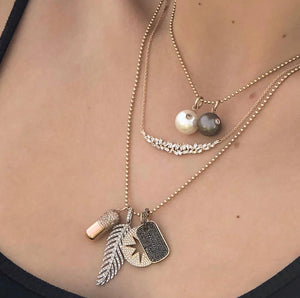 White Pearl with Bezel Set Diamond
Bezel Set Diamond with White Pearl Pendant
White Pearl Diamond Necklace
White Pearl Charm with Bezel Set Diamond
Bezel Set White Pearl with Diamond
White pearl charm
Diamond pendant
Bezel set diamond
Fine jewelry
Designer necklace
Luxury jewelry
Statement pendant
Custom charm
Pearl pendant
