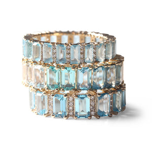 TOPAZ AND DIAMOND BAGUETTE CUT ETERNITY BAND 